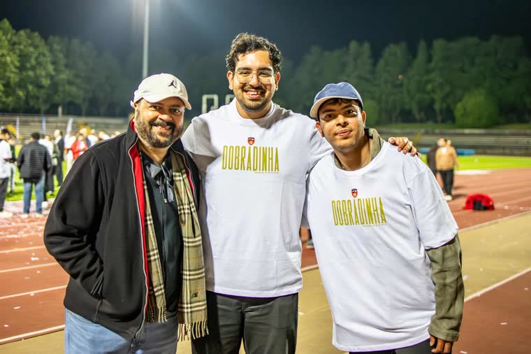 Jai Agarwal with two others on the track after the title celebration